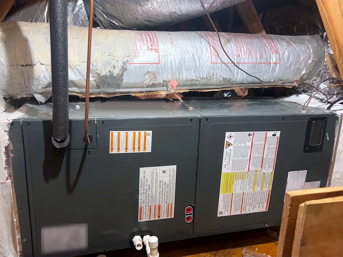 Attic air-handler equipment photographed by Phillips HVAC in Central Florida.